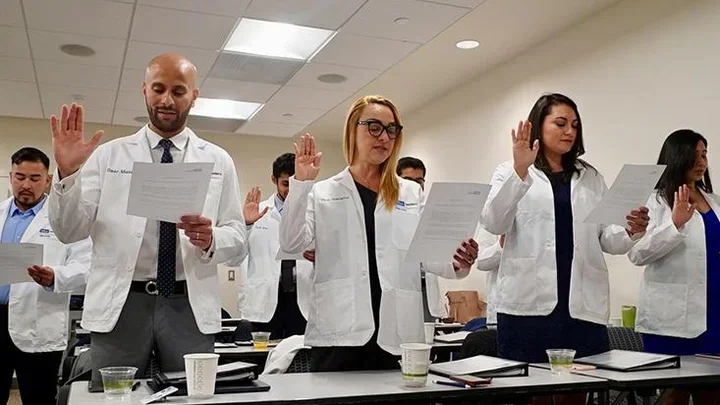 International dentists taking oath
